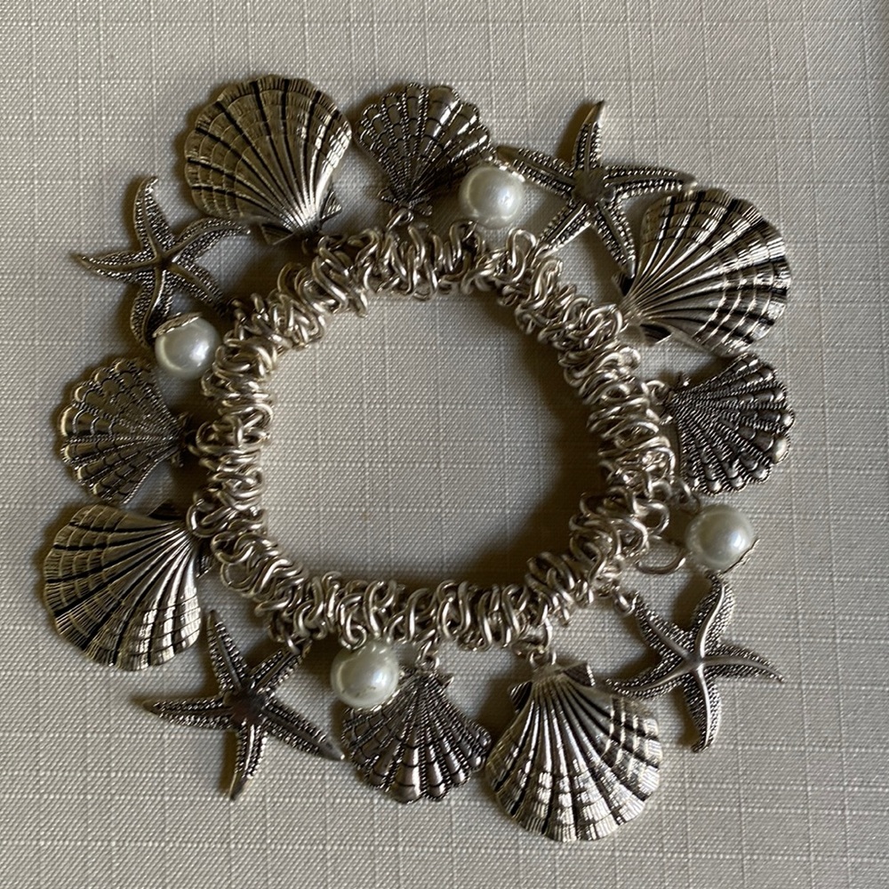 Stretchy silver shell and pearl bracelet
